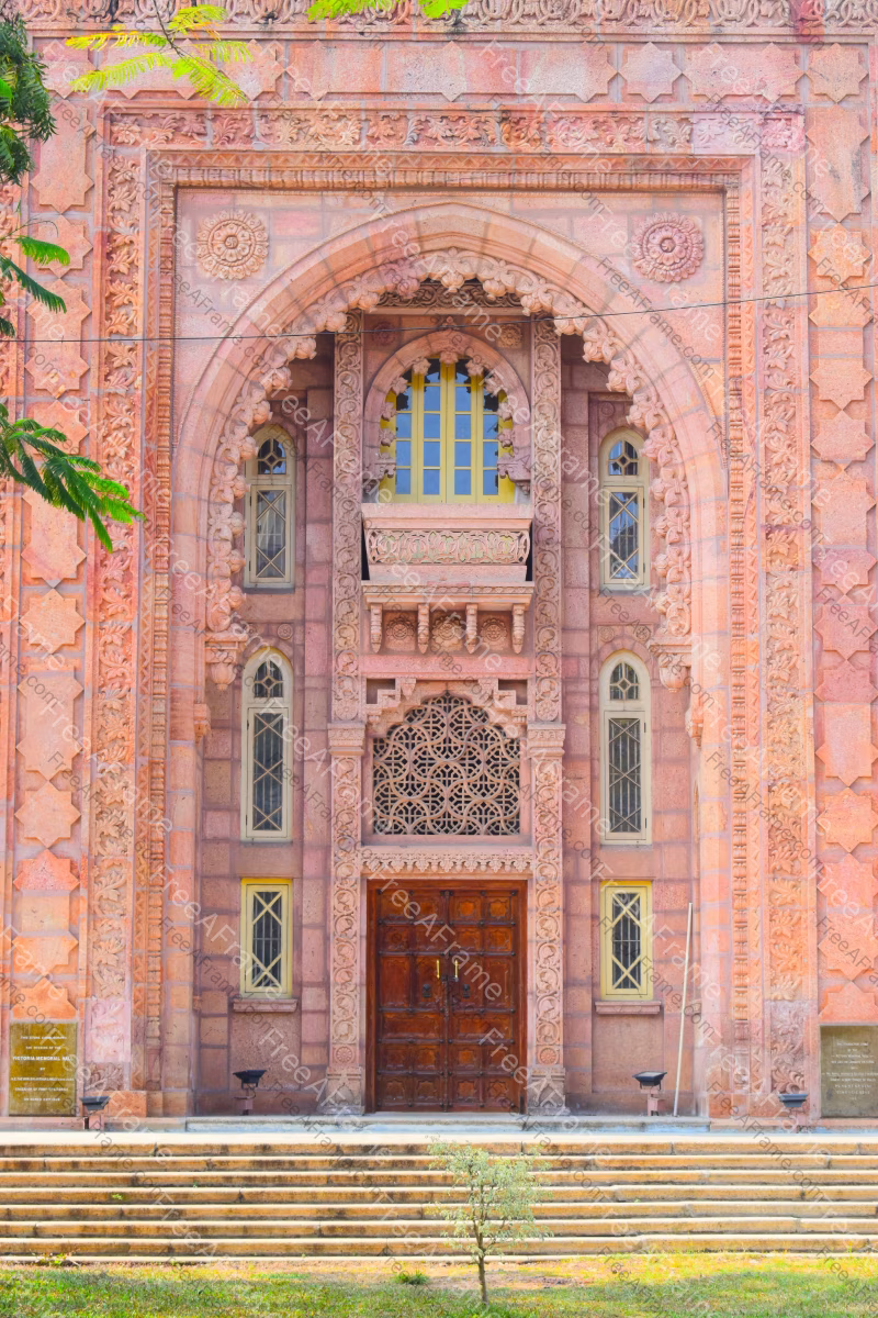 A large pink door. 